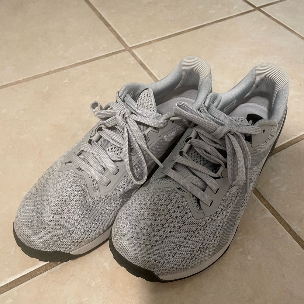 Women’s Reebok Nano X tennis shoes.